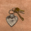 Load image into Gallery viewer, Leather star kering in antique gold.