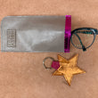 Load image into Gallery viewer, Leather star kering in electric orange with a glasses case.