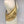 Load image into Gallery viewer, gold leather crossbody bag worn across a mannequin

