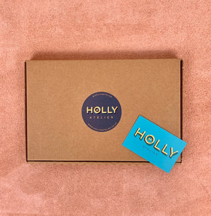 A box with Holly M Atelier logo
