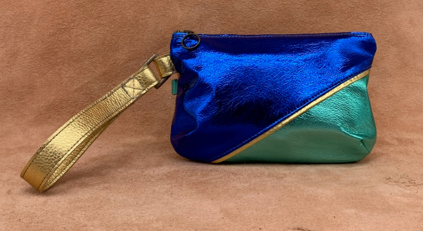 A leather clutch bag in electric blues and gold