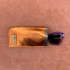Glasses pouches in electric orange.