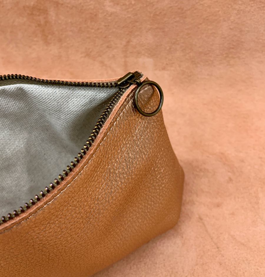 Close up of zip on Luxury Leather Wash Bag i rose gold