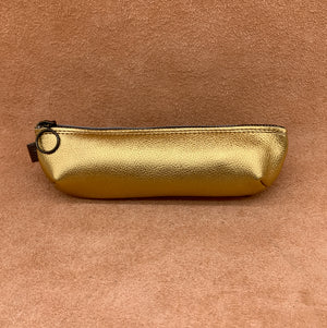 Soft leather pencil ase in gold.