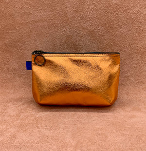 Soft leather purse in electric orange.