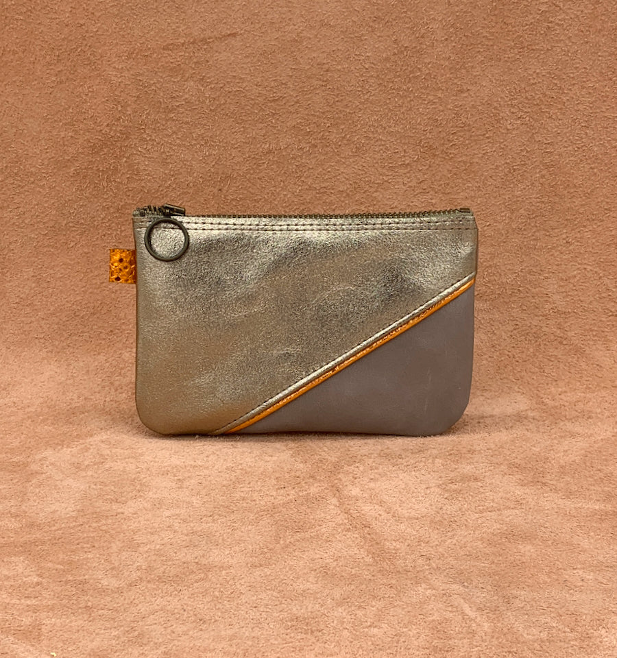 Split front leather purse in antique gold, elec orange, ghost.