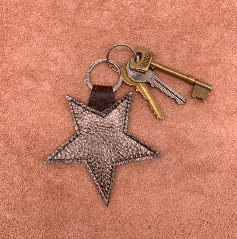 Leather star kering in antique gold
