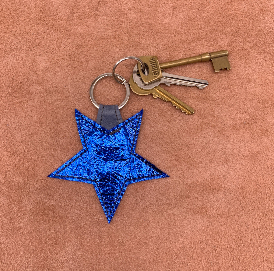 Leather star kering in electric blue