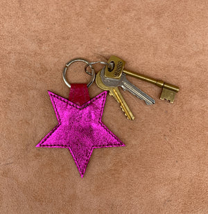 Leather star kering in electric pink